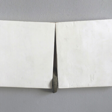 Carol Greenwood plaster on wood panel, found stone